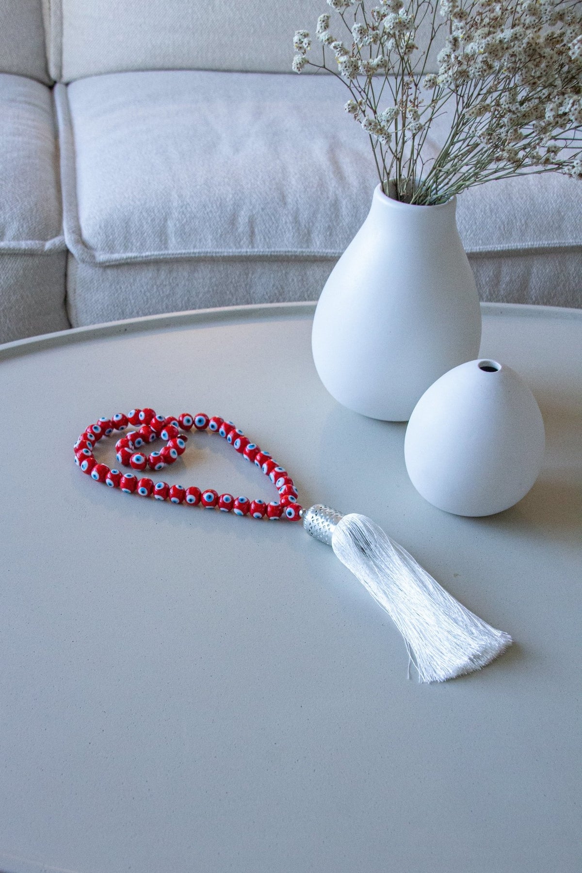 Evil eye bead strand • Turquoise evil eye • Glass bead evil eye • Handmade evil eye • Misbaha beads • Modern prayer beads • Table decor evil eye • Boho home decor • Evil eye protection • Middle Eastern home decor • Housewarming gift • Meaningful gift • Stylish Luck • Made in Israel
שרשרת עין הרע • חרוזי עין • קישוט שולחן • אובייקט עיצובי • חרוזי זכוכית בעבודת יד • מסבחה מודרנית • שמירה מעין הרע • עיצוב הבית • חפצי נוי • מתנה לחנוכת בית • מתנה משמעותית • סמלי מזל • Stylish Luck • מיוצר בישראל