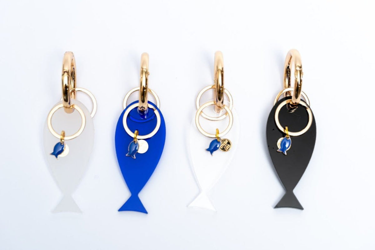 Fish lucky charm - key holder White acrylic Gold plated key holder - stylish luck home decor מחזיק מפתחות דג • מחזיק מפתחות מעוצב • דג לשמירה • סמלי מזל • שמירה מעין הרע • מתנה קטנה • מתנה לאישה • מתנה לחברה • Stylish Luck • מיוצר בישראל