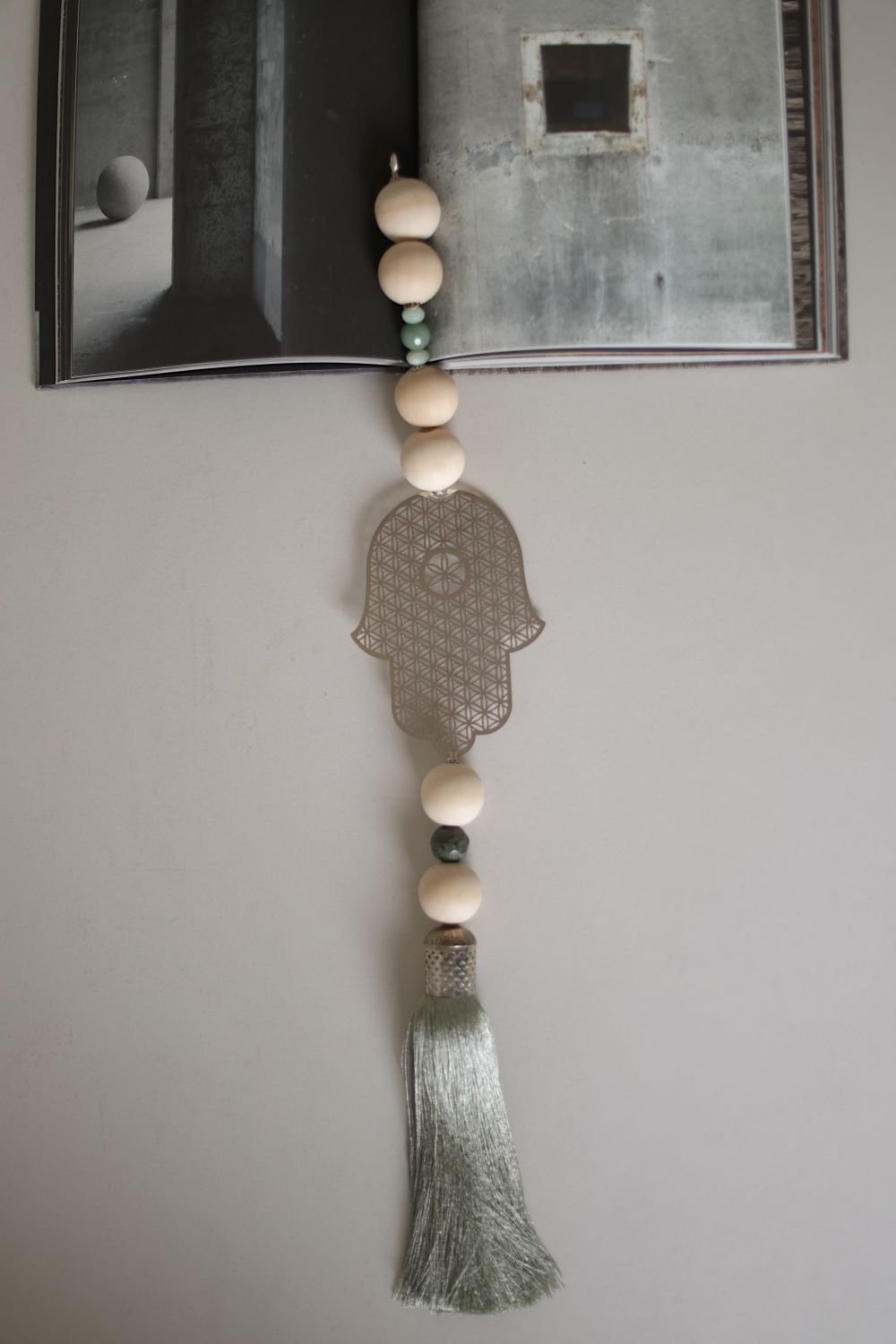 Hamsa wall hanging
Silver Hamsa
Flower of Life Hamsa
Wood bead Hamsa
Hamsa with stones
Natural home decor
Boho wall hanging
Sacred geometry decor
Spiritual home decor
Housewarming gift
Made in Israel
Stylish Luck
חמסה לקיר
חמסה כסף
חמסת פרח החיים
חמסה עם חרוזי עץ
חמסה עם אבנים
סמלי מזל
שמירה לבית
מתנה לחנוכת בית
Stylish Luck
עיצוב הבית
מיוצר בישראל

