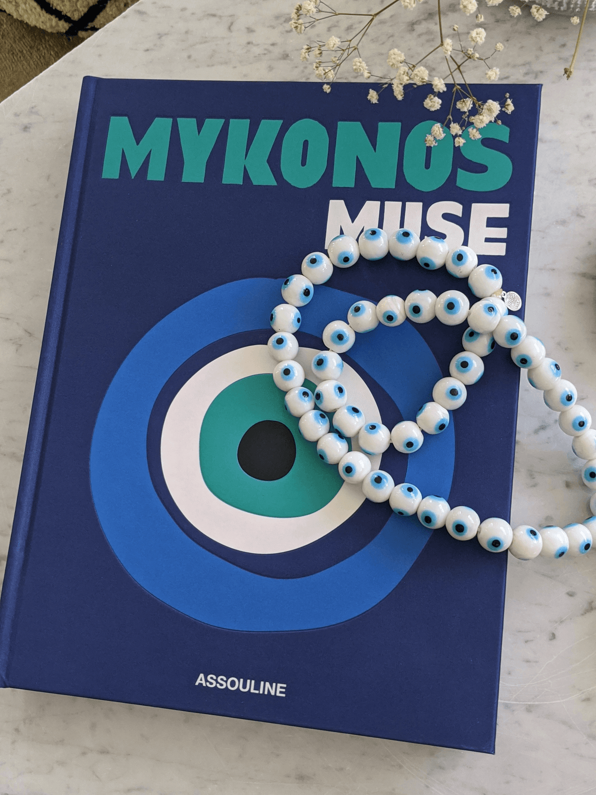 
Evil eye bead strand • Blue evil eye • Glass bead evil eye • Handmade evil eye • Misbaha beads • Modern prayer beads • Table decor evil eye • Boho home decor • Evil eye protection • Middle Eastern home decor • Housewarming gift • Meaningful gift • Stylish Luck • Made in Israel

שרשרת עין הרע • חרוזי עין • קישוט שולחן • אובייקט עיצובי • חרוזי זכוכית בעבודת יד • מסבחה מודרנית • שמירה מעין הרע • עיצוב הבית • חפצי נוי • מתנה לחנוכת בית • מתנה משמעותית • סמלי מזל • Stylish Luck • מיוצר בישראל